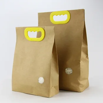 100 adet/grup Stand up Kraft Kağıt Torba Taşınabilir Plastik Saplı Pirinç Paketleme Çantası Un Çay Hediye Gıda Çantası